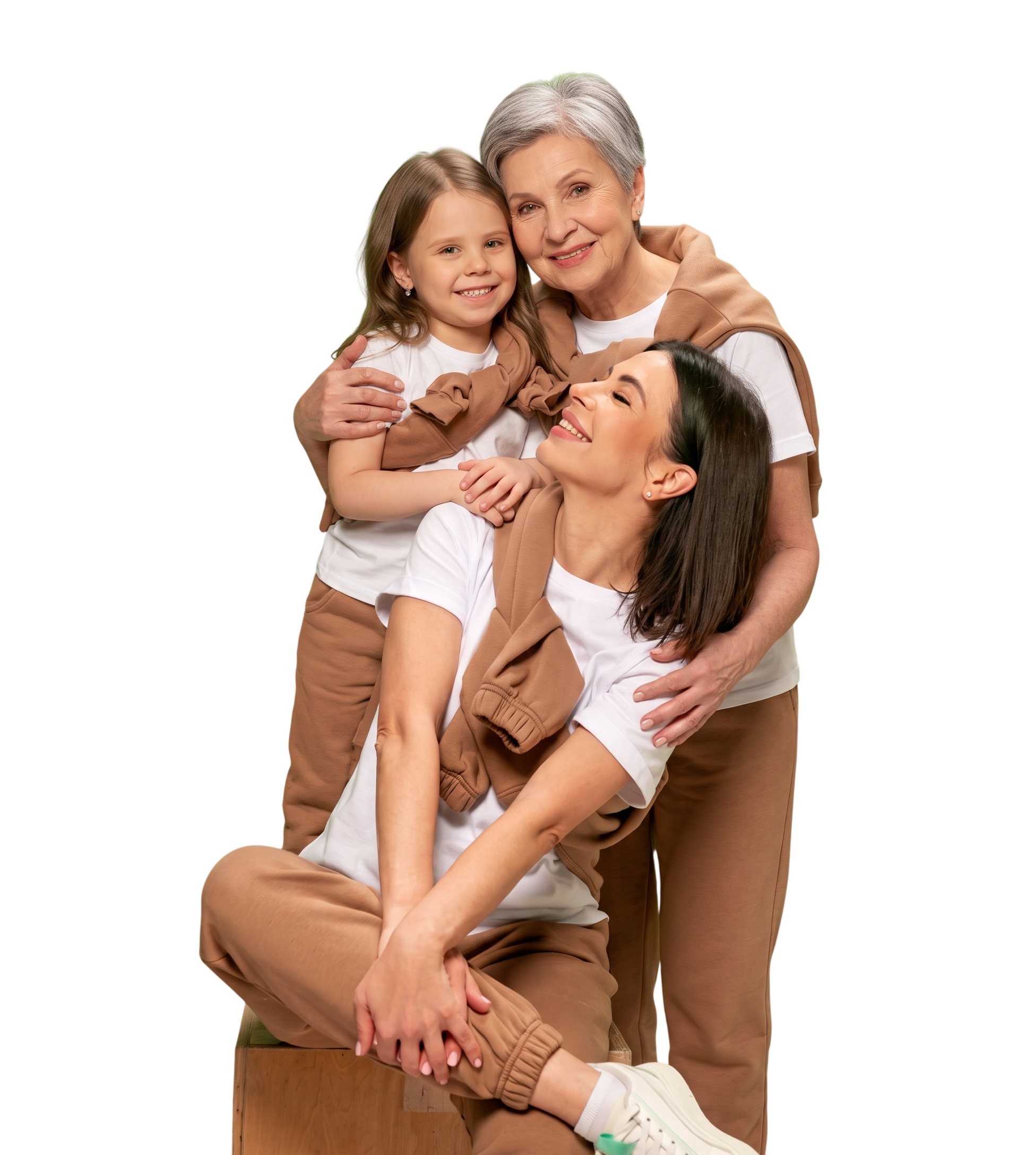Família sorrindo — avó, mãe e filha